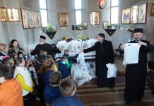 Programul eparhial de Sfintele Paşti cu daruri pentru copiii a continuat în judeţul Galaţi